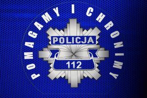 Policyjna gwiazda z numerem 112 i napisem Pomagamy i chronimy