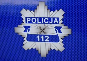 Odznaka policyjna z numerem 112